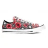 Chuck Taylor All Star Low “Allover Mix Logo Play”